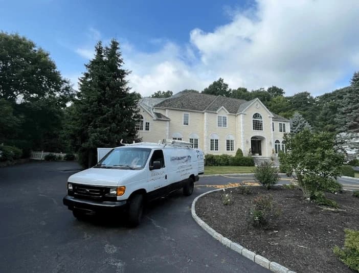 Broadview Heights Power Washing technician performing thorough gutter cleaning service in Broadview Heights